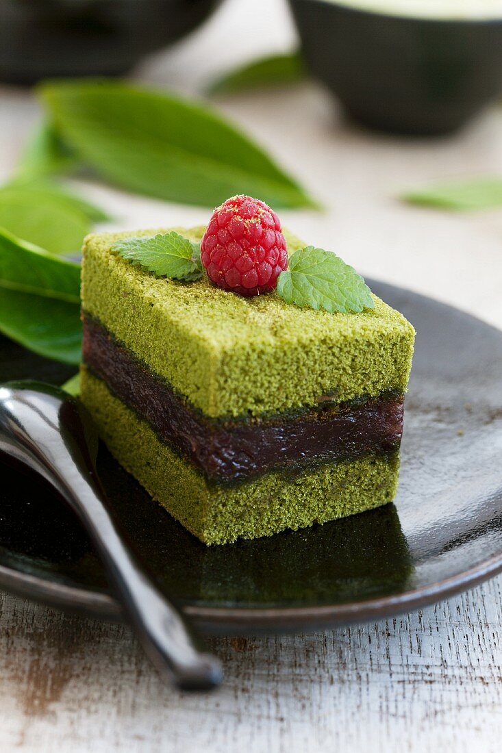 Green tea cake filled with azuki beans – License Images – 11115232 ...