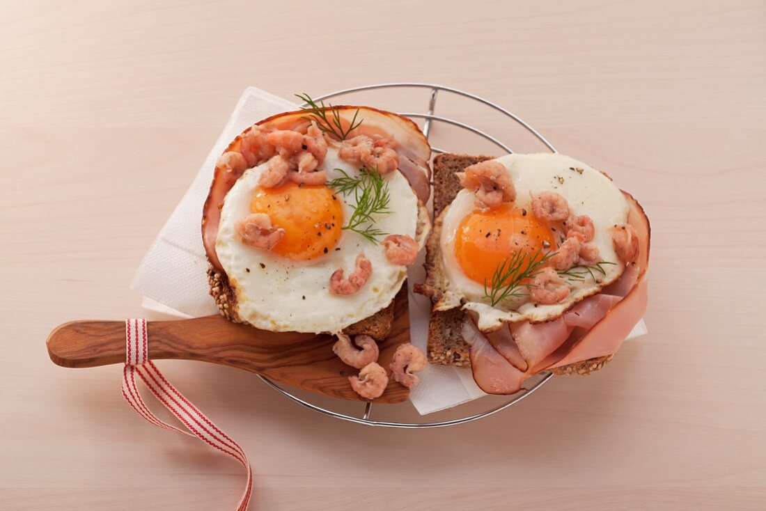 Ham and eggs on toast with North Sea prawns