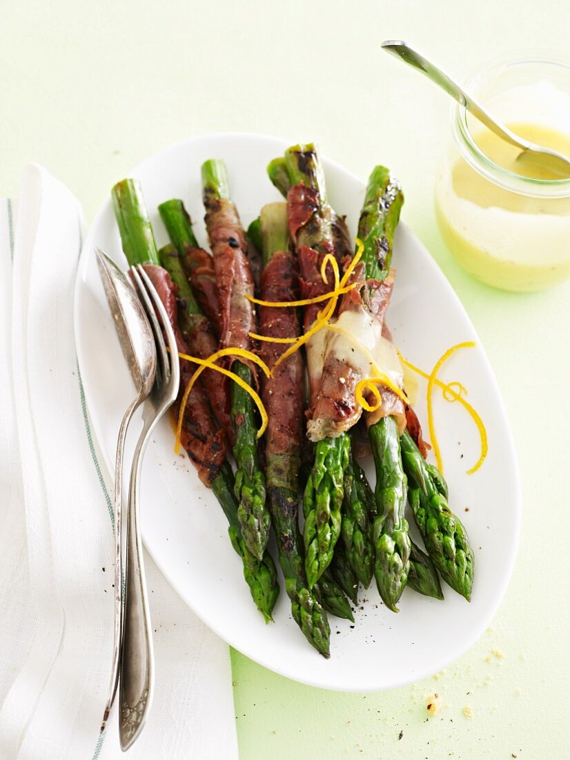 Grilled asparagus wrapped in Serrano ham