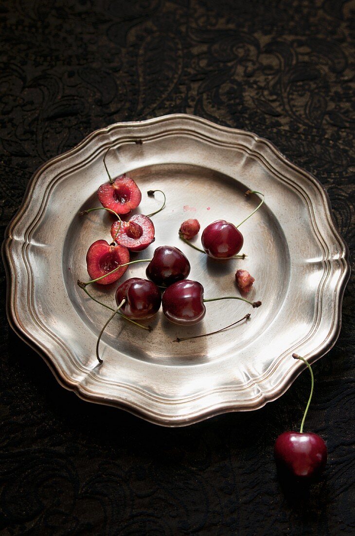 Cherries on a zinc plate