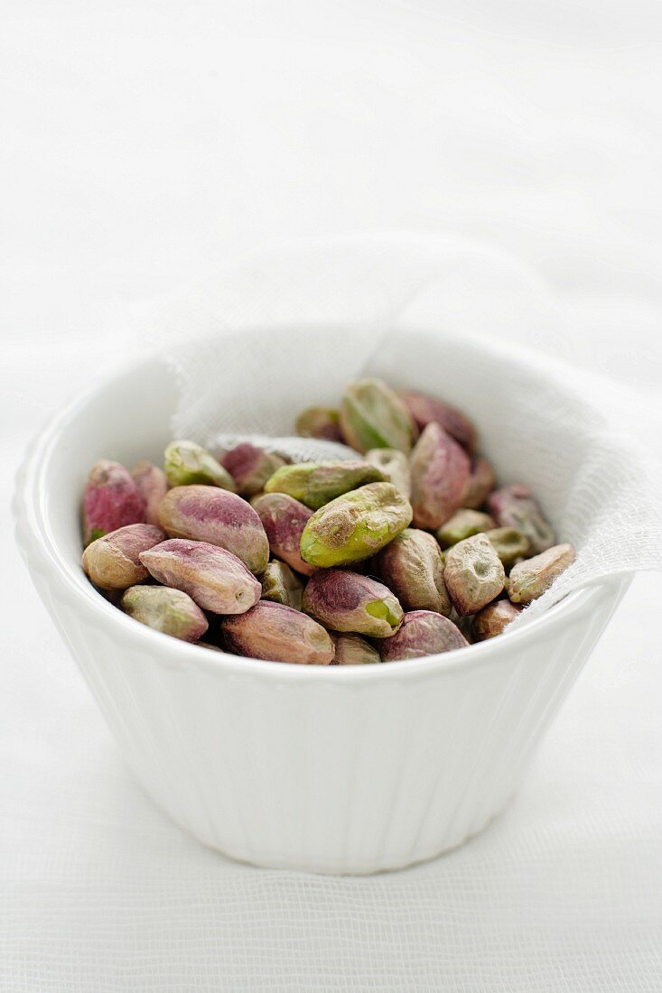 Pistachios in a small bowl