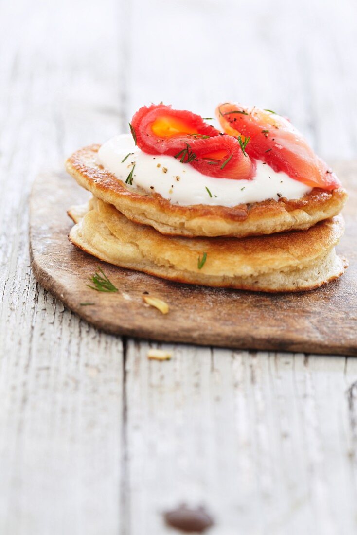 Blinis with sour cream and salmon