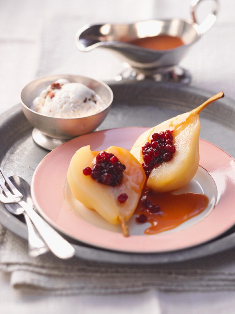 Pears with lingonberries and ice cream