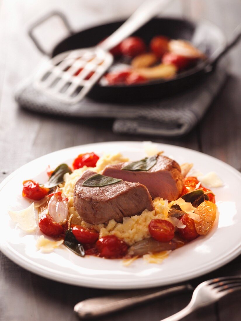 Veal medallions with sage and cherry tomatoes