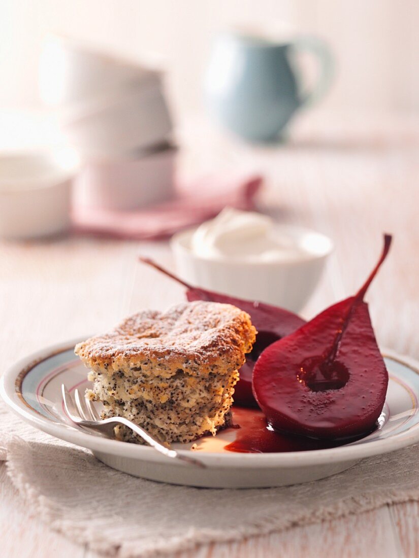 A poppy seed muffin with red wine pears