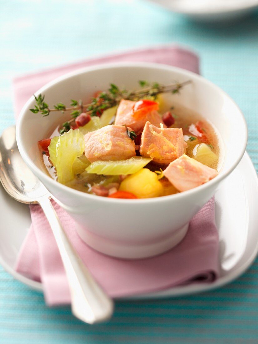Salmon stew with celery and diced bacon