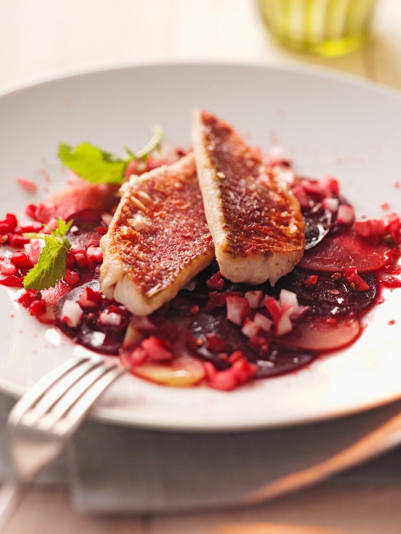 Red mullet fillets on beetroot and turnip carpaccio