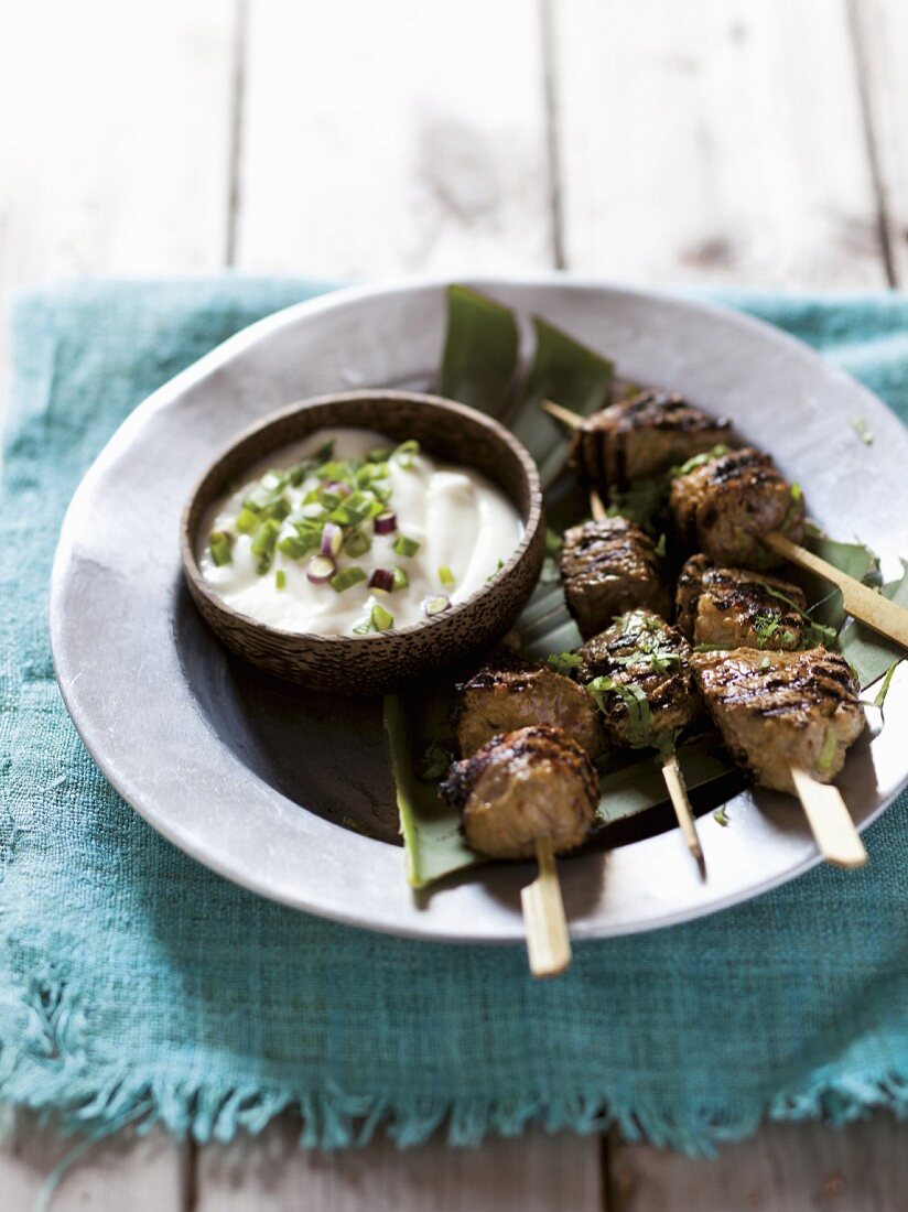 Tandoori lamb skewers with yoghurt dip