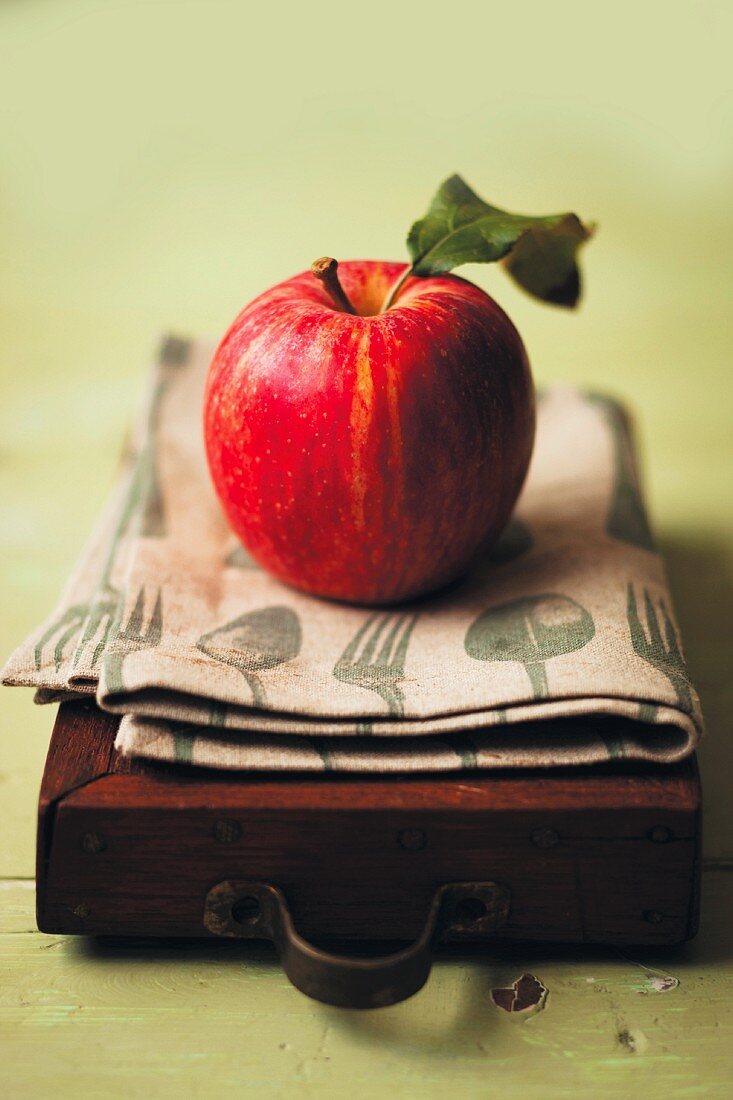 A Royal Beauty apple with a leaf