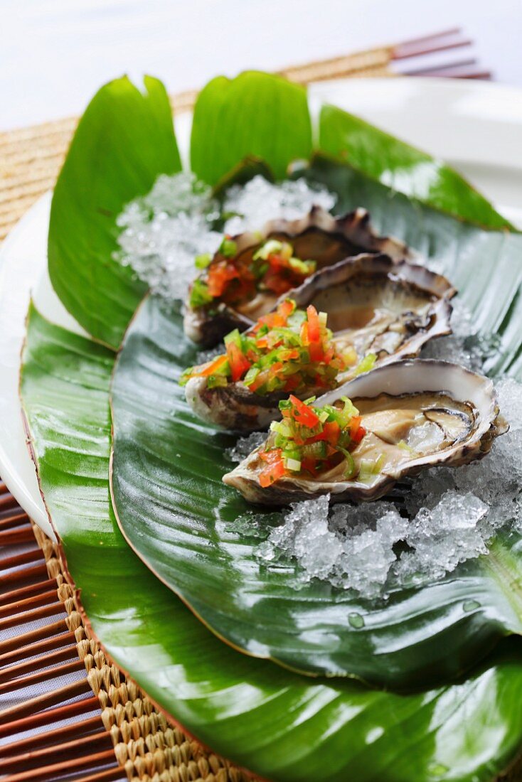 Oysters with Mediterranean salsa and lemon juice