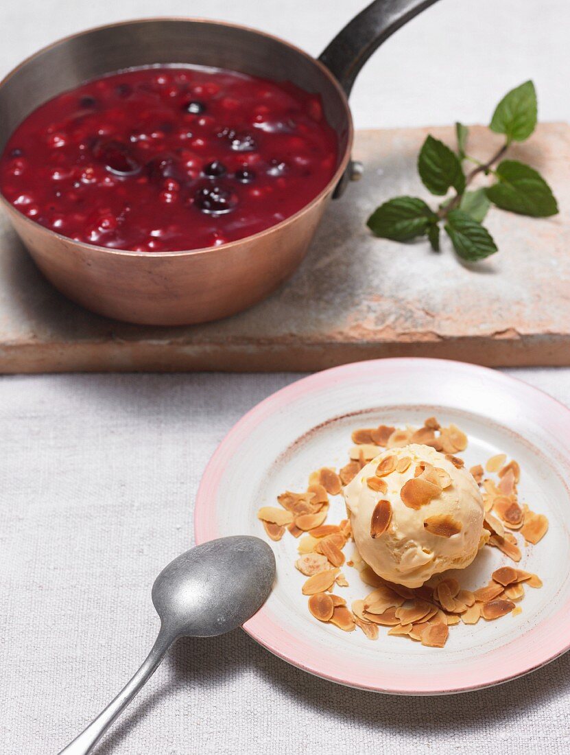 Almond ice cream with berry compote
