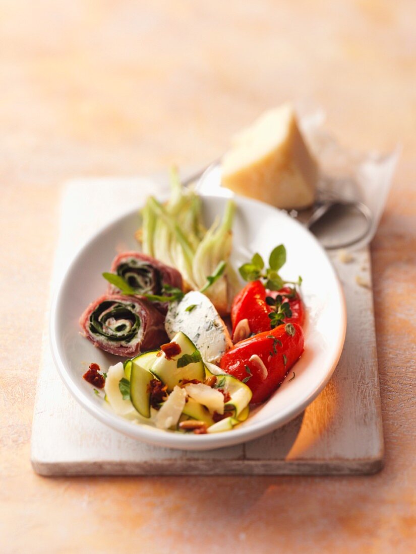 Antipasto misto e parmigiano (antipasti platter with Parmesan cheese)