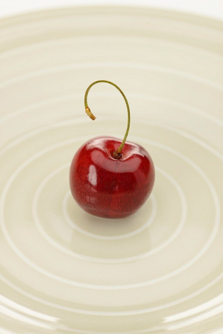 A cherry with a bent stalk