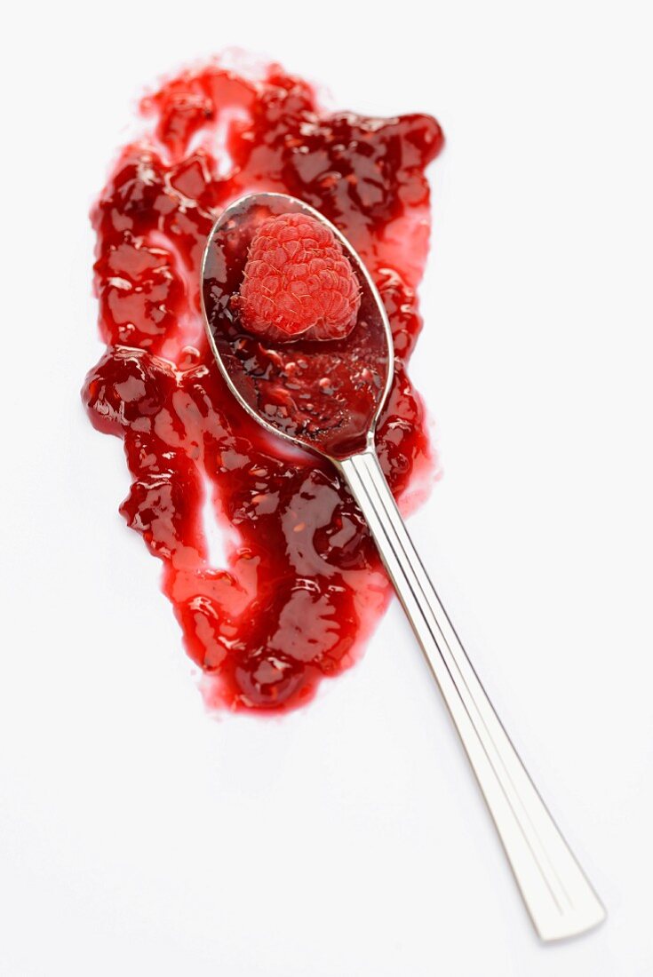 Raspberry jam on a spoon