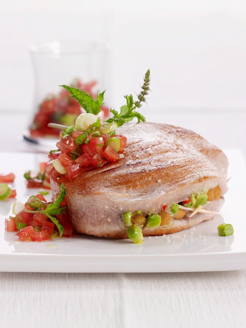 Stuffed tuna fish steak with tomato salsa