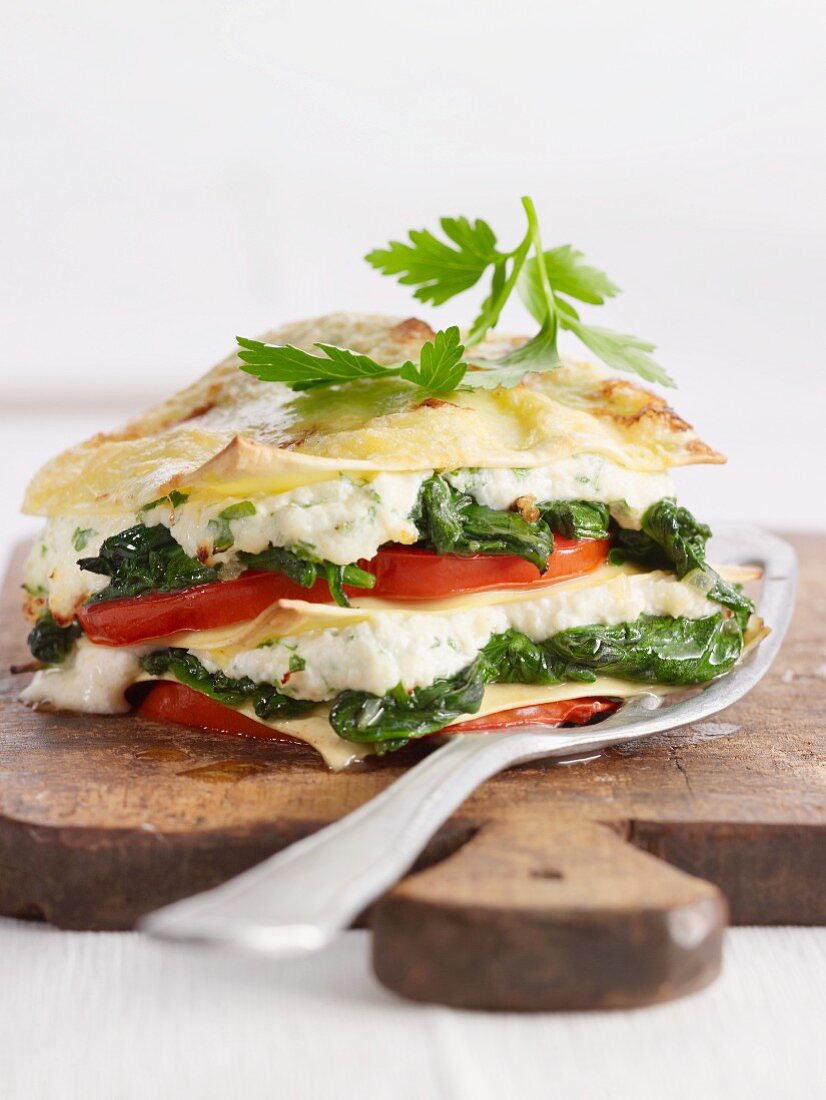 Vegetable lasagne with spinach and tomatoes