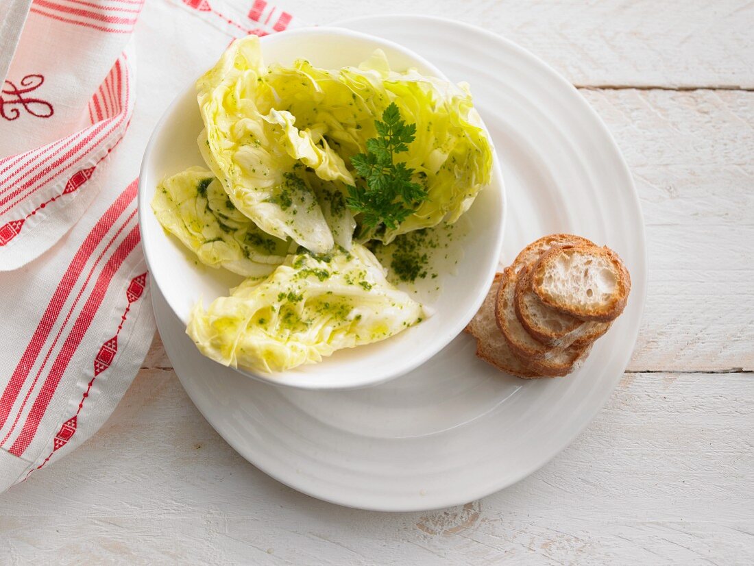 Lettuce leaves and a herb vinaigrette