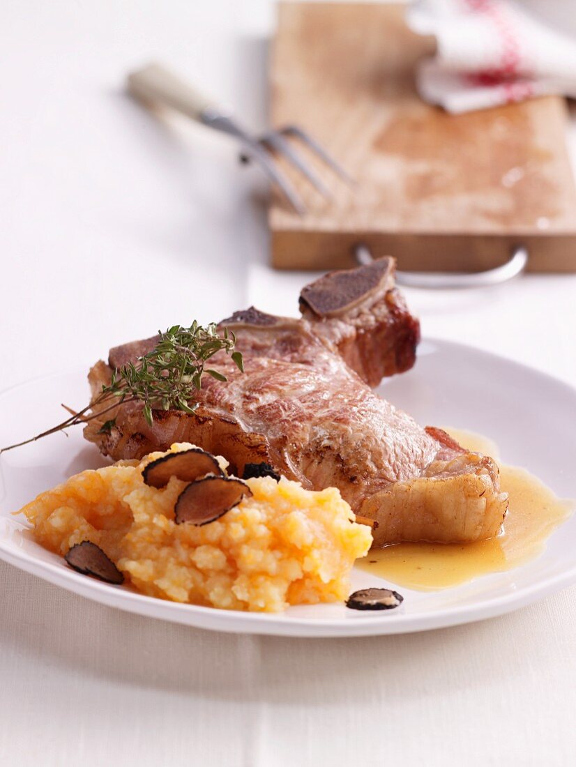 Stuffed veal chop with mashed pumpkin and truffles