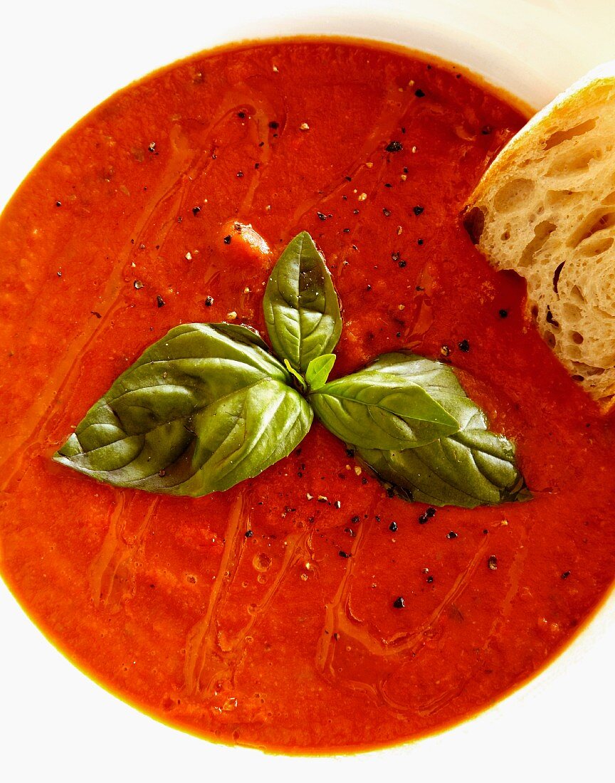 Tomato soup with basil (seen from above)