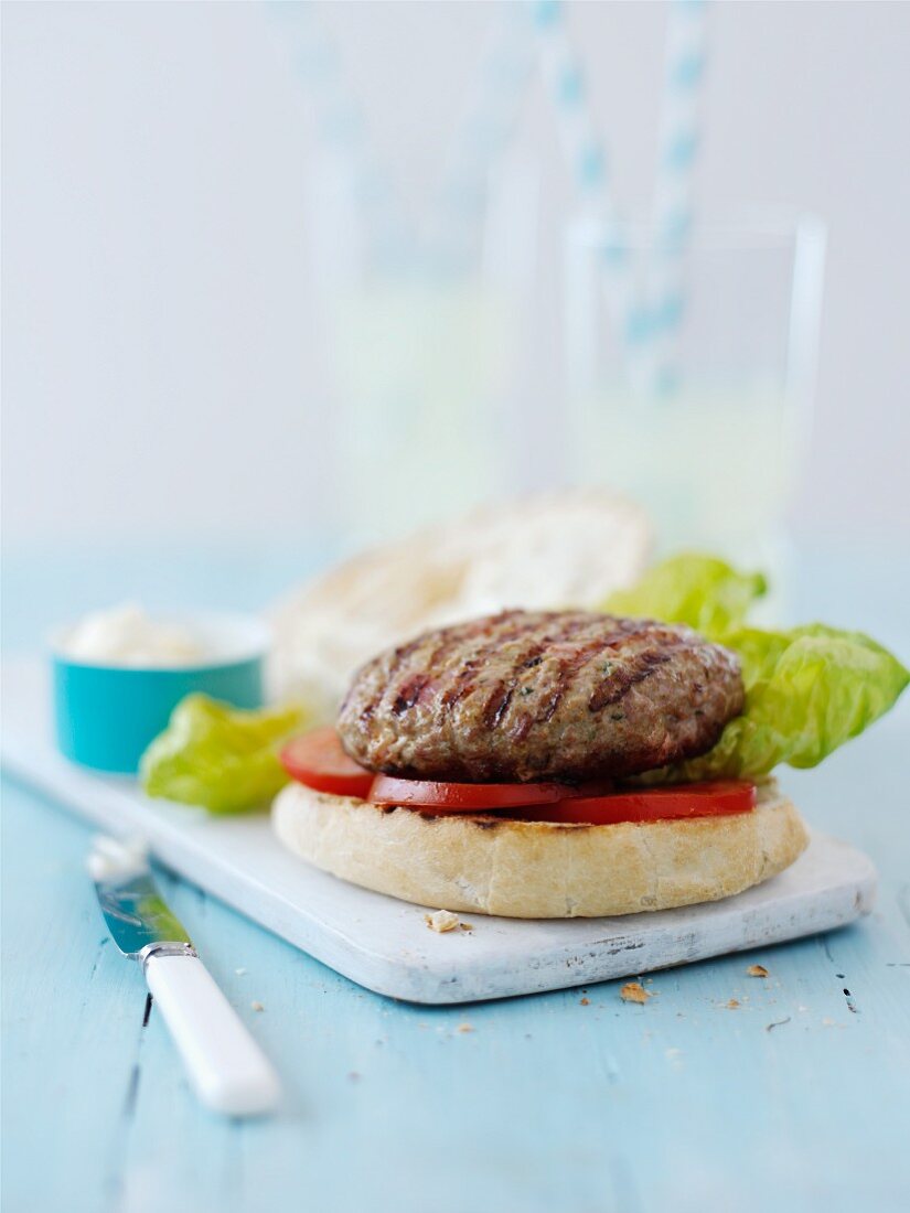 Turkey burger with tomatoes and lettuce (Italy)