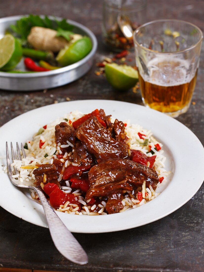 Beef with chilli and peppers on lime rice