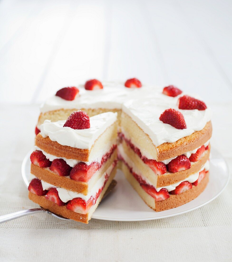 Layered Strawberry and Cream Cake; Slice Removed