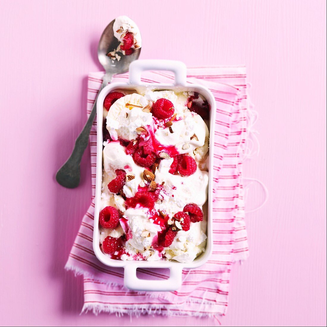 Raspberries and vanilla ice cream with meringue