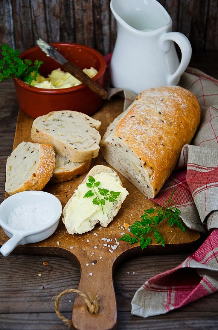 Fresh bread with butter and salt