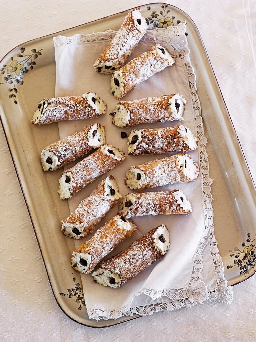 Cannoli (deep-fried pastry tubes filled with ricotta cream)