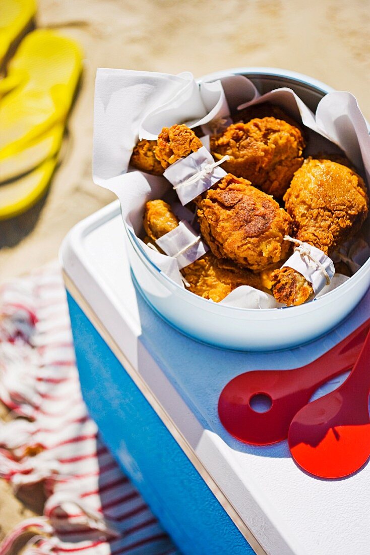 Chicken drumsticks at a picnic