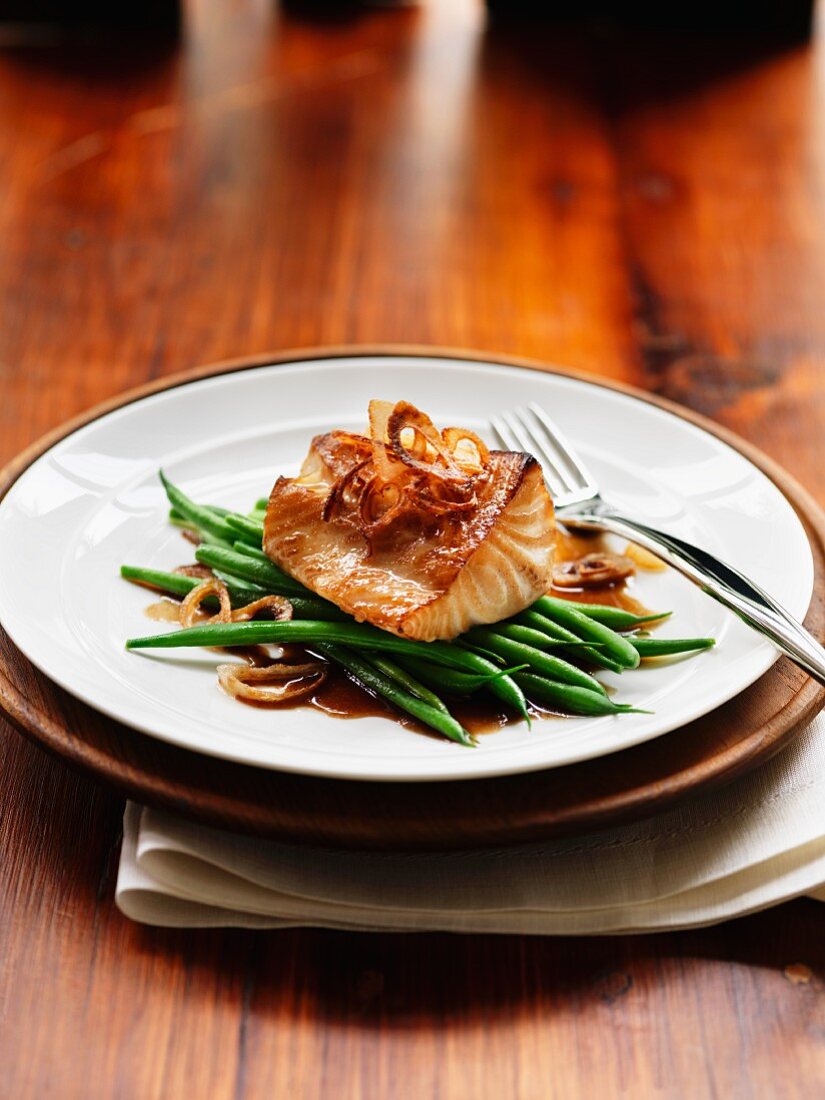Caramelised sablefish on a bed of green beans (Asia)