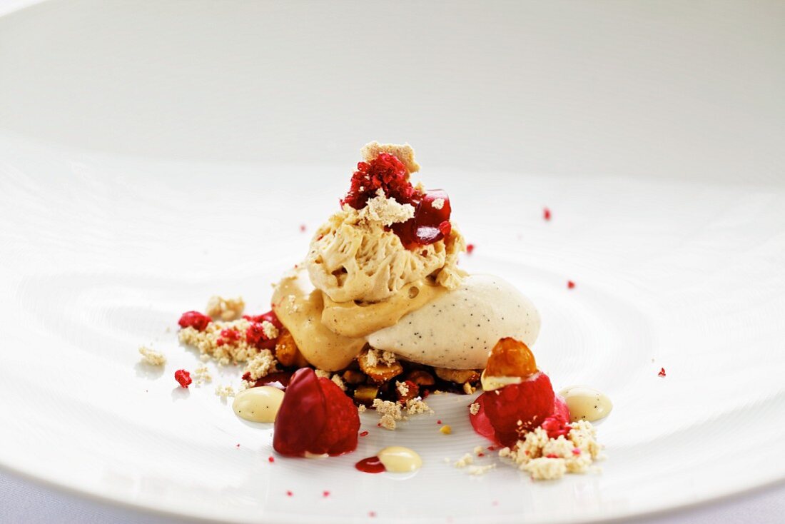 Hazelnut dessert with vanilla ice cream and raspberries