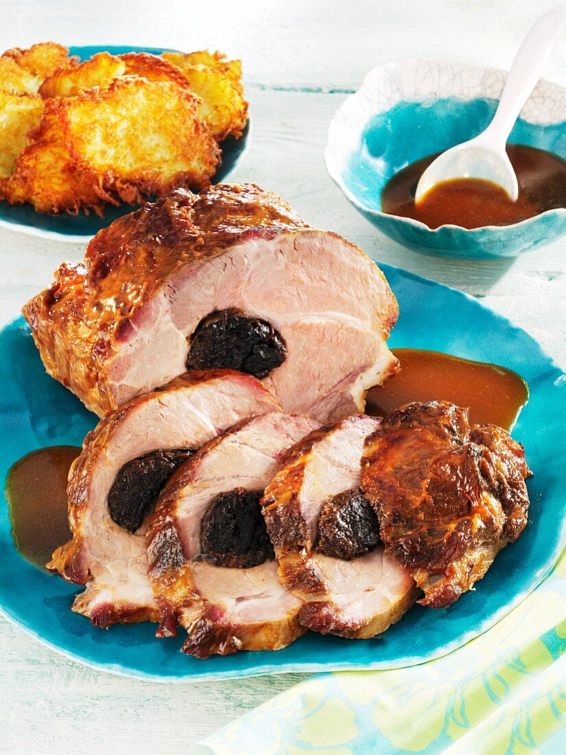 Smoked pork neck filled with a plum filling and a mustard crust