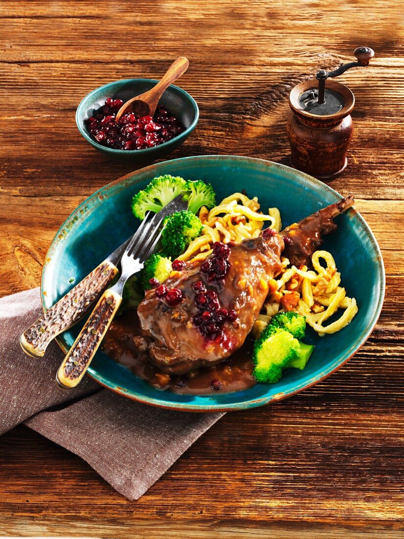 Braised leg of hare with lingonberry sauce, Spätzle (soft egg noodles from Swabia) and broccoli