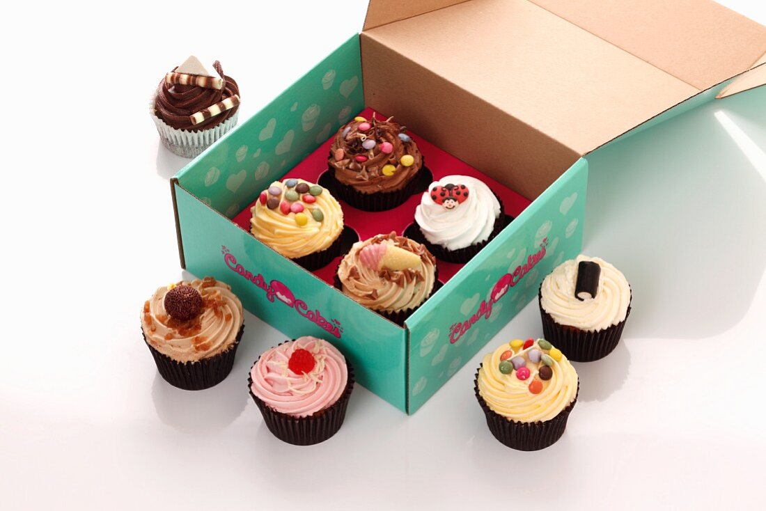 Various cupcakes in a box