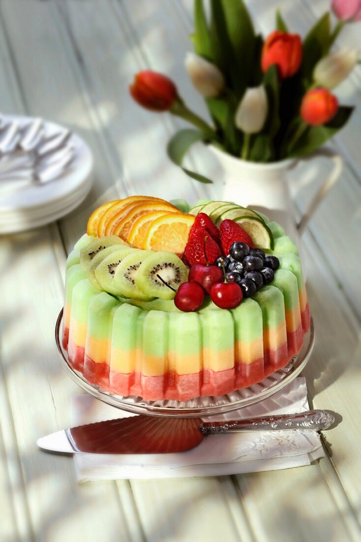 An ice cream cake with fresh fruit