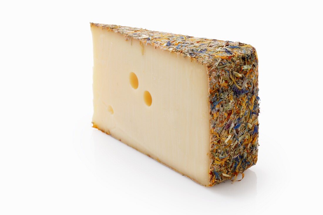 Hard cheese with meadow flowers