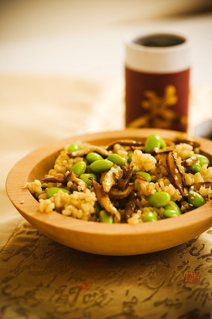 Bowl of Brown Rice with Edamame and Sliced Mushrooms