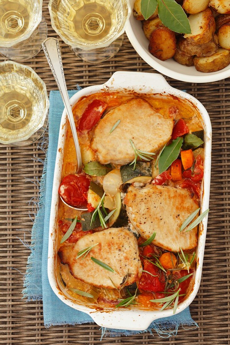 Pork escalopes with vegetables and roast potatoes