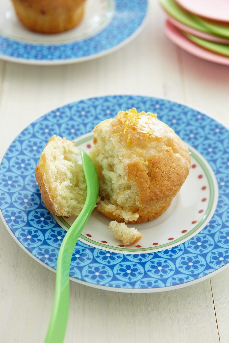 Lemon muffin, partly eaten