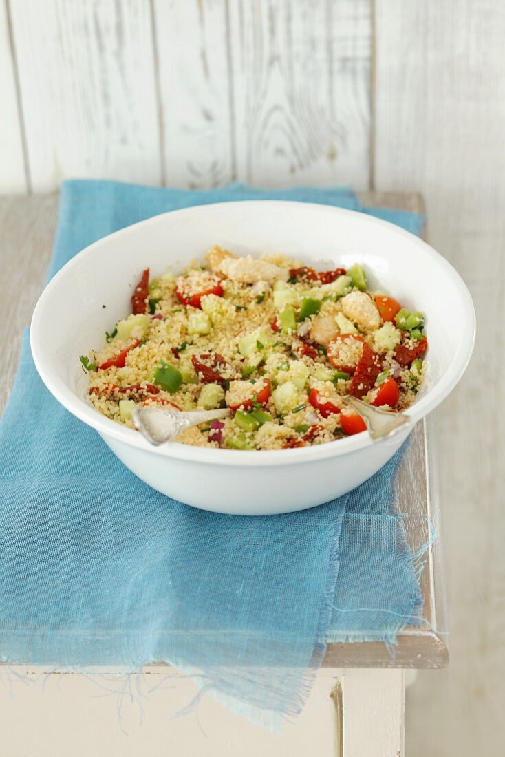 Couscous salad with chicken, cucumber and tomatoes