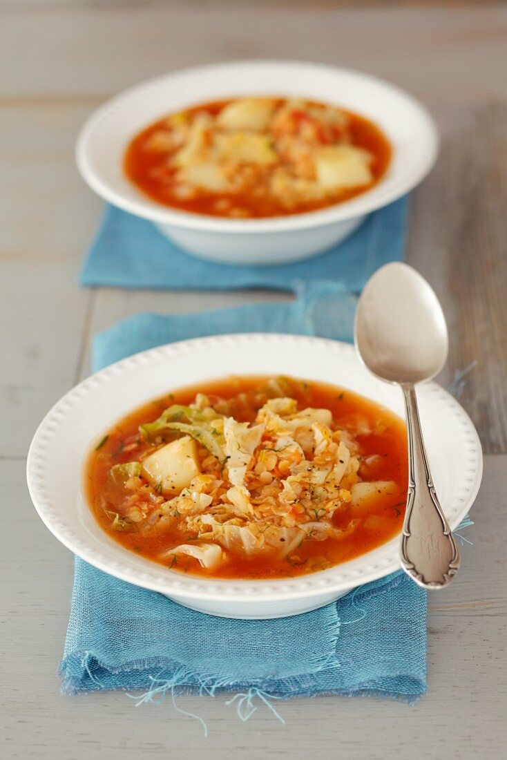 Savoy cabbage soup with lentils, tomatoes and potatoes