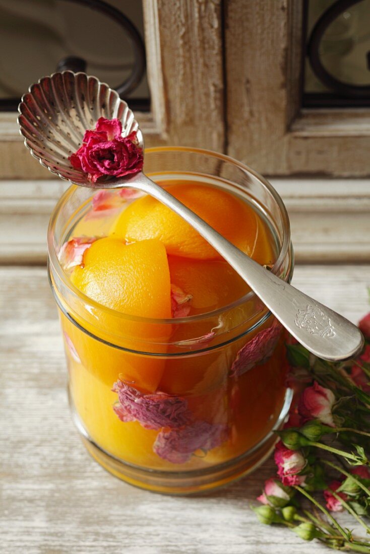 Preserved peaches with rose petals