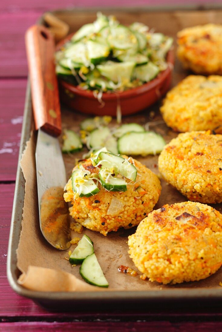 Couscous cakes with a cucumber and bean sprout salad