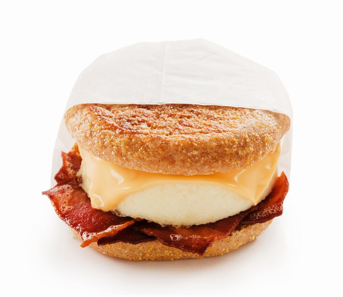 Bacon Egg and Cheese Breakfast Sandwich on an English Muffin; White Background