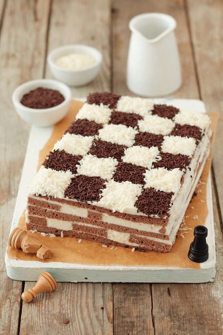 A chessboard cake (coconut and chocolate sponge cake)
