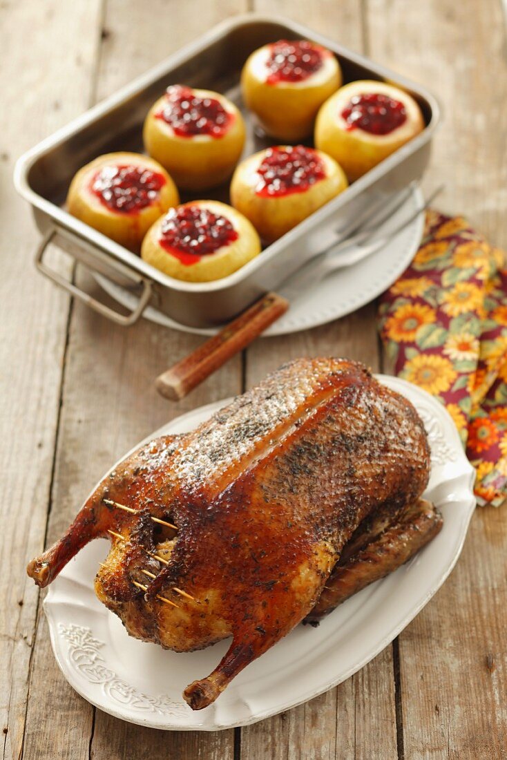 Roast duck with apples and cranberries