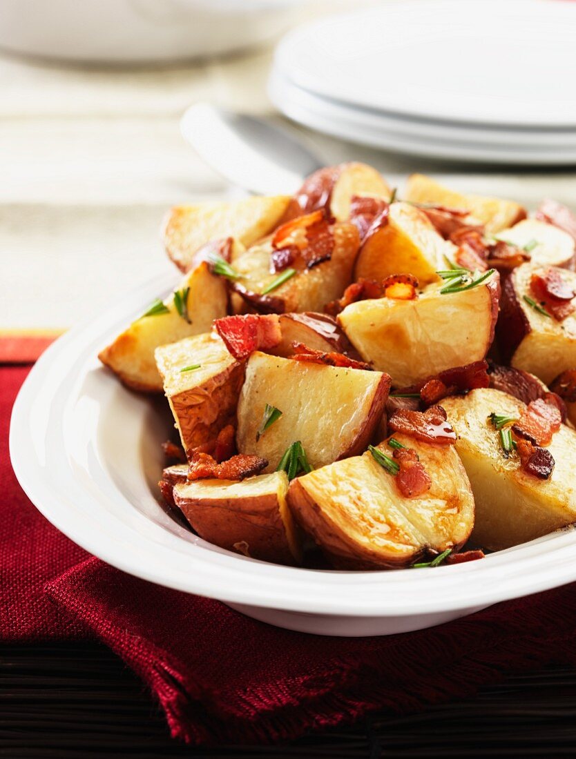 Roast potatoes with bacon and herbs