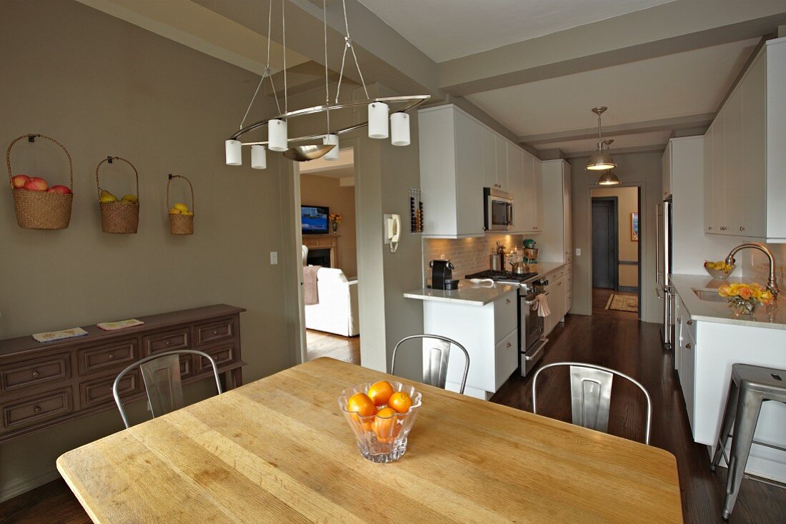 Wooden Table with Metal Chairs in a Kitchen