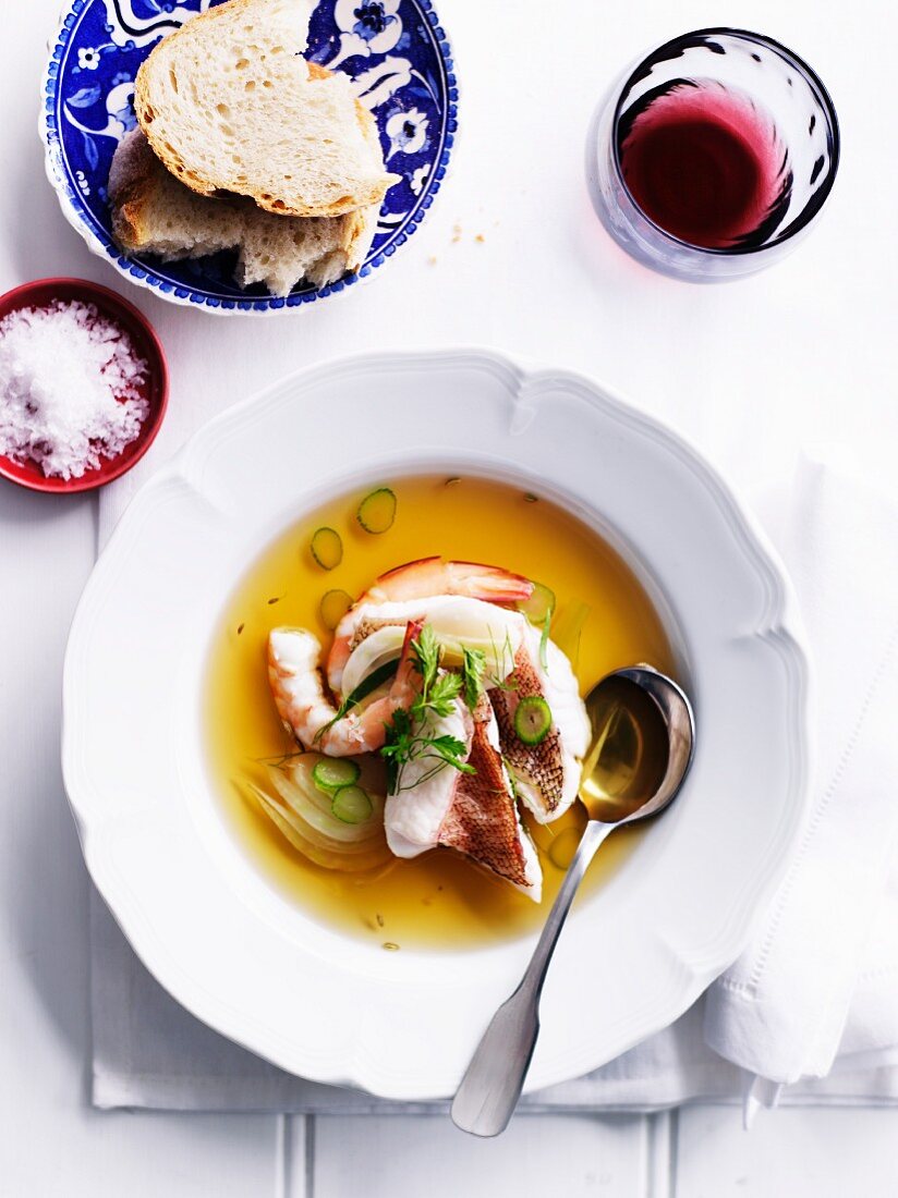 Consomme with fish and prawns